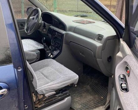 Синий Киа Карнивал, объемом двигателя 2.9 л и пробегом 328 тыс. км за 2300 $, фото 3 на Automoto.ua