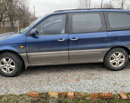 Синий Киа Карнивал, объемом двигателя 2.9 л и пробегом 328 тыс. км за 2300 $, фото 1 на Automoto.ua