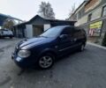 Синій Кіа Карнівал, об'ємом двигуна 2.9 л та пробігом 290 тис. км за 3416 $, фото 1 на Automoto.ua