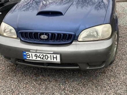 Синій Кіа Карнівал, об'ємом двигуна 2.9 л та пробігом 328 тис. км за 2300 $, фото 1 на Automoto.ua