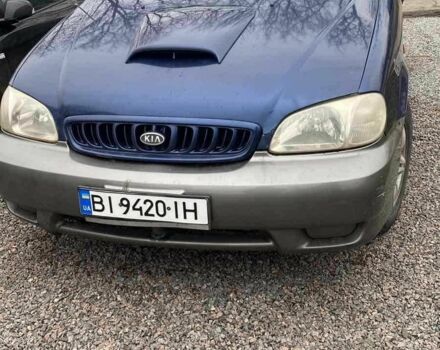 Синий Киа Карнивал, объемом двигателя 2.9 л и пробегом 328 тыс. км за 2300 $, фото 1 на Automoto.ua