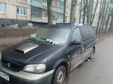 Синій Кіа Карнівал, об'ємом двигуна 0 л та пробігом 200 тис. км за 600 $, фото 1 на Automoto.ua