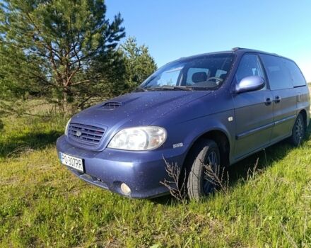 Синий Киа Карнивал, объемом двигателя 3 л и пробегом 269 тыс. км за 2500 $, фото 1 на Automoto.ua