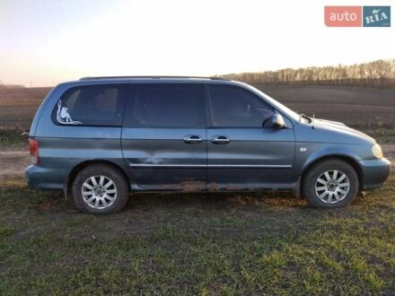 Синий Киа Карнивал, объемом двигателя 2.9 л и пробегом 240 тыс. км за 2450 $, фото 1 на Automoto.ua