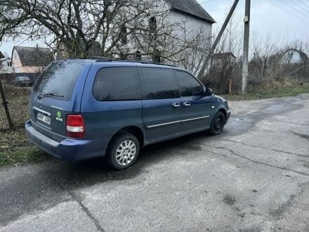 Синий Киа Карнивал, объемом двигателя 2.9 л и пробегом 260 тыс. км за 2300 $, фото 1 на Automoto.ua