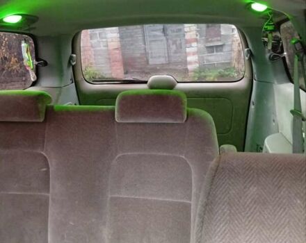 Синий Киа Карнивал, объемом двигателя 2.9 л и пробегом 367 тыс. км за 1800 $, фото 1 на Automoto.ua