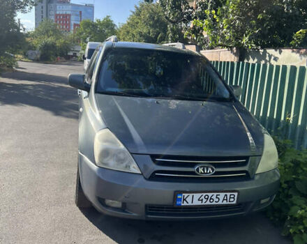 Синий Киа Карнивал, объемом двигателя 2.7 л и пробегом 415 тыс. км за 5400 $, фото 1 на Automoto.ua