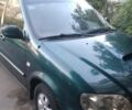 Зеленый Киа Карнивал, объемом двигателя 2.9 л и пробегом 200 тыс. км за 3200 $, фото 1 на Automoto.ua
