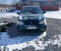 Зеленый Киа Карнивал, объемом двигателя 2.9 л и пробегом 240 тыс. км за 3750 $, фото 1 на Automoto.ua