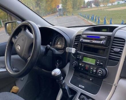 Зеленый Киа Карнивал, объемом двигателя 2.66 л и пробегом 336 тыс. км за 6299 $, фото 1 на Automoto.ua