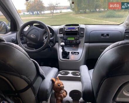 Зеленый Киа Карнивал, объемом двигателя 2.66 л и пробегом 336 тыс. км за 6299 $, фото 3 на Automoto.ua