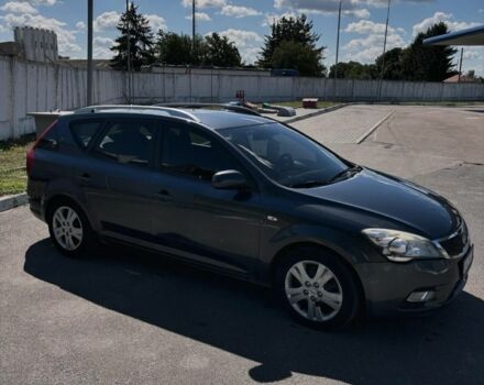 Серый Киа Сид, объемом двигателя 1.4 л и пробегом 200 тыс. км за 6000 $, фото 4 на Automoto.ua
