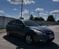 Серый Киа Сид, объемом двигателя 1.4 л и пробегом 200 тыс. км за 6000 $, фото 2 на Automoto.ua