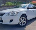 Белый Киа Сид, объемом двигателя 1.4 л и пробегом 225 тыс. км за 5200 $, фото 2 на Automoto.ua