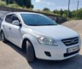 Белый Киа Сид, объемом двигателя 1.4 л и пробегом 225 тыс. км за 5400 $, фото 1 на Automoto.ua