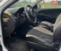 Белый Киа Сид, объемом двигателя 1.59 л и пробегом 260 тыс. км за 6500 $, фото 11 на Automoto.ua