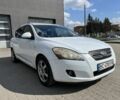 Белый Киа Сид, объемом двигателя 2 л и пробегом 289 тыс. км за 5600 $, фото 1 на Automoto.ua