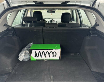 Белый Киа Сид, объемом двигателя 1.58 л и пробегом 242 тыс. км за 7000 $, фото 17 на Automoto.ua