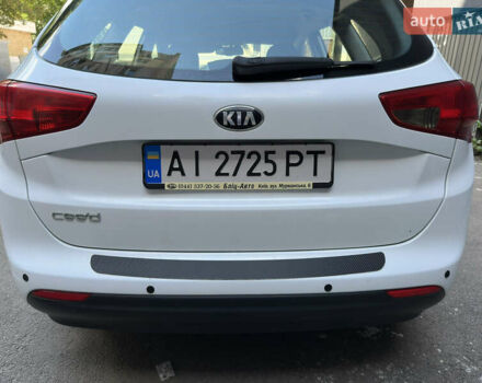 Белый Киа Сид, объемом двигателя 1.59 л и пробегом 66 тыс. км за 12000 $, фото 4 на Automoto.ua
