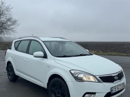 Білий Кіа Сід, об'ємом двигуна 1.6 л та пробігом 242 тис. км за 7000 $, фото 1 на Automoto.ua