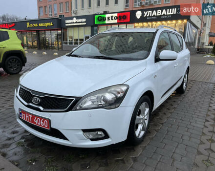 Белый Киа Сид, объемом двигателя 1.4 л и пробегом 143 тыс. км за 6700 $, фото 1 на Automoto.ua