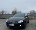 Черный Киа Сид, объемом двигателя 1.4 л и пробегом 210 тыс. км за 6100 $, фото 1 на Automoto.ua