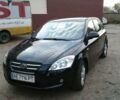 Черный Киа Сид, объемом двигателя 2 л и пробегом 240 тыс. км за 7500 $, фото 1 на Automoto.ua