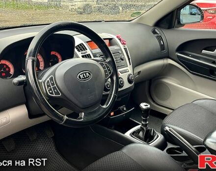 Чорний Кіа Сід, об'ємом двигуна 1.6 л та пробігом 310 тис. км за 5990 $, фото 6 на Automoto.ua