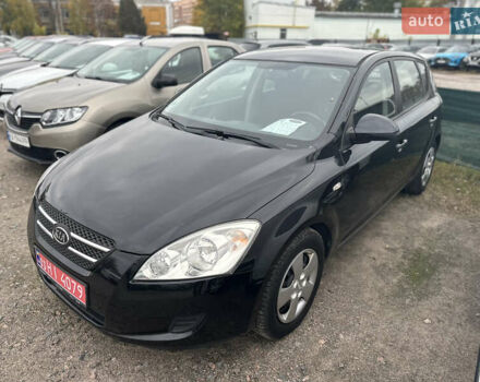 Черный Киа Сид, объемом двигателя 1.4 л и пробегом 161 тыс. км за 5500 $, фото 6 на Automoto.ua