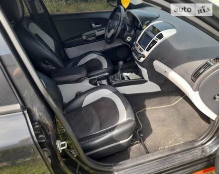 Черный Киа Сид, объемом двигателя 2 л и пробегом 244 тыс. км за 6500 $, фото 2 на Automoto.ua