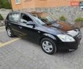 Черный Киа Сид, объемом двигателя 1.4 л и пробегом 243 тыс. км за 5400 $, фото 1 на Automoto.ua
