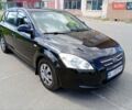 Черный Киа Сид, объемом двигателя 1.4 л и пробегом 180 тыс. км за 5400 $, фото 1 на Automoto.ua