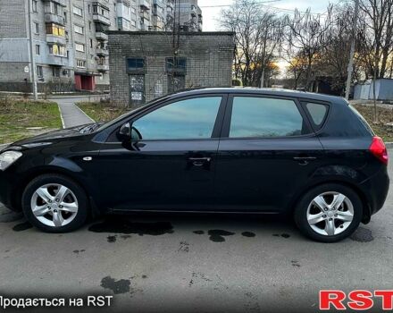 Чорний Кіа Сід, об'ємом двигуна 20 л та пробігом 143 тис. км за 7690 $, фото 1 на Automoto.ua