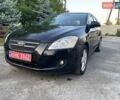 Черный Киа Сид, объемом двигателя 1.6 л и пробегом 237 тыс. км за 5650 $, фото 1 на Automoto.ua
