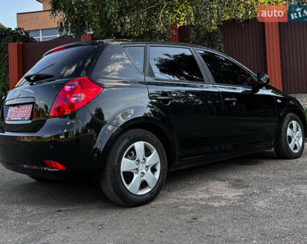 Черный Киа Сид, объемом двигателя 1.4 л и пробегом 219 тыс. км за 5800 $, фото 16 на Automoto.ua