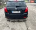 Черный Киа Сид, объемом двигателя 1.4 л и пробегом 323 тыс. км за 4200 $, фото 1 на Automoto.ua