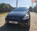Чорний Кіа Сід, об'ємом двигуна 1.4 л та пробігом 285 тис. км за 4600 $, фото 1 на Automoto.ua