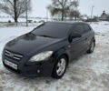 Чорний Кіа Сід, об'ємом двигуна 1.99 л та пробігом 174 тис. км за 7600 $, фото 1 на Automoto.ua