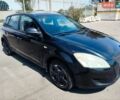 Черный Киа Сид, объемом двигателя 1.4 л и пробегом 205 тыс. км за 3950 $, фото 1 на Automoto.ua