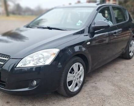 Черный Киа Сид, объемом двигателя 1.6 л и пробегом 220 тыс. км за 5850 $, фото 1 на Automoto.ua