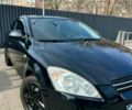 Чорний Кіа Сід, об'ємом двигуна 1.4 л та пробігом 193 тис. км за 5599 $, фото 1 на Automoto.ua