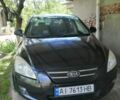 Чорний Кіа Сід, об'ємом двигуна 1.4 л та пробігом 215 тис. км за 5300 $, фото 1 на Automoto.ua