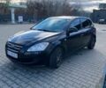 Черный Киа Сид, объемом двигателя 1.4 л и пробегом 216 тыс. км за 5600 $, фото 1 на Automoto.ua