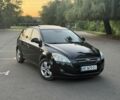 Чорний Кіа Сід, об'ємом двигуна 1.6 л та пробігом 127 тис. км за 4999 $, фото 1 на Automoto.ua