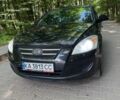 Чорний Кіа Сід, об'ємом двигуна 1.58 л та пробігом 299 тис. км за 4000 $, фото 1 на Automoto.ua