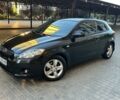 Чорний Кіа Сід, об'ємом двигуна 1.4 л та пробігом 188 тис. км за 4950 $, фото 1 на Automoto.ua