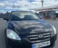 Черный Киа Сид, объемом двигателя 1.4 л и пробегом 182 тыс. км за 6100 $, фото 1 на Automoto.ua
