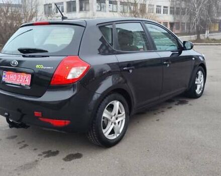 Черный Киа Сид, объемом двигателя 1.4 л и пробегом 215 тыс. км за 6000 $, фото 6 на Automoto.ua