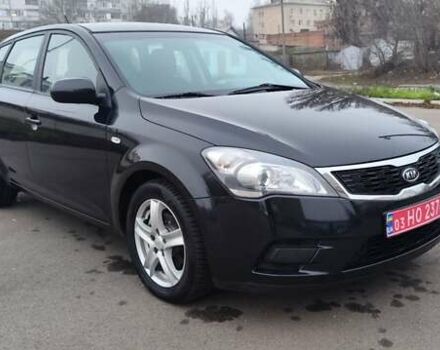 Черный Киа Сид, объемом двигателя 1.4 л и пробегом 215 тыс. км за 6000 $, фото 1 на Automoto.ua