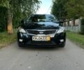 Черный Киа Сид, объемом двигателя 1.4 л и пробегом 183 тыс. км за 5600 $, фото 1 на Automoto.ua